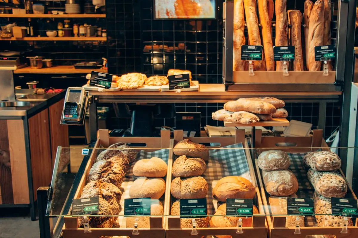 Bread and pastries on a bakery shelf